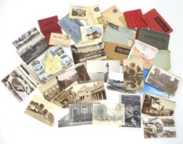 A quantity of assorted early to mid 20thC sepia postcards, topographical subjects, locations to