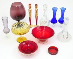 A quantity of assorted glassware to include pedestal blue glass vases, candlesticks, decanters,