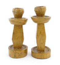 A pair of naive carved fruitwood candlesticks. Approx. 11 1/2" high (2) Please Note - we do not make