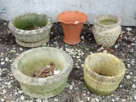 Five assorted planters and plant pots, the largest approx 18" in diameter Please Note - we do not