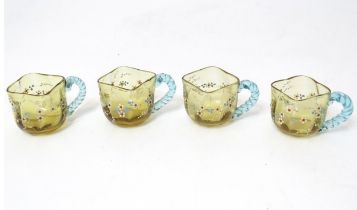 Four Venetian style glass cups with floral detail. Approx. 1 1/2" high Please Note - we do not