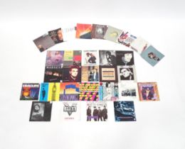 A quantity of late 20thC 45rpm vinyl singles, including picture sleeve examples Eurythmics, UB40,