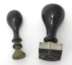 A hand / desk seal and a stamp with ebonised handles. Largest approx. 2 1/2" (2) Please Note - we do