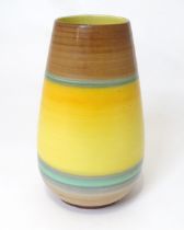 A Shelley vase of tapering form with stripe detail. Marked under. Approx. 9 1/4" high Please