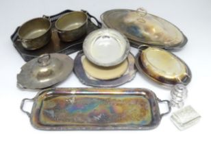 A quantity of assorted silver plated wares to include entree dishes, trays, bread plates, etc.
