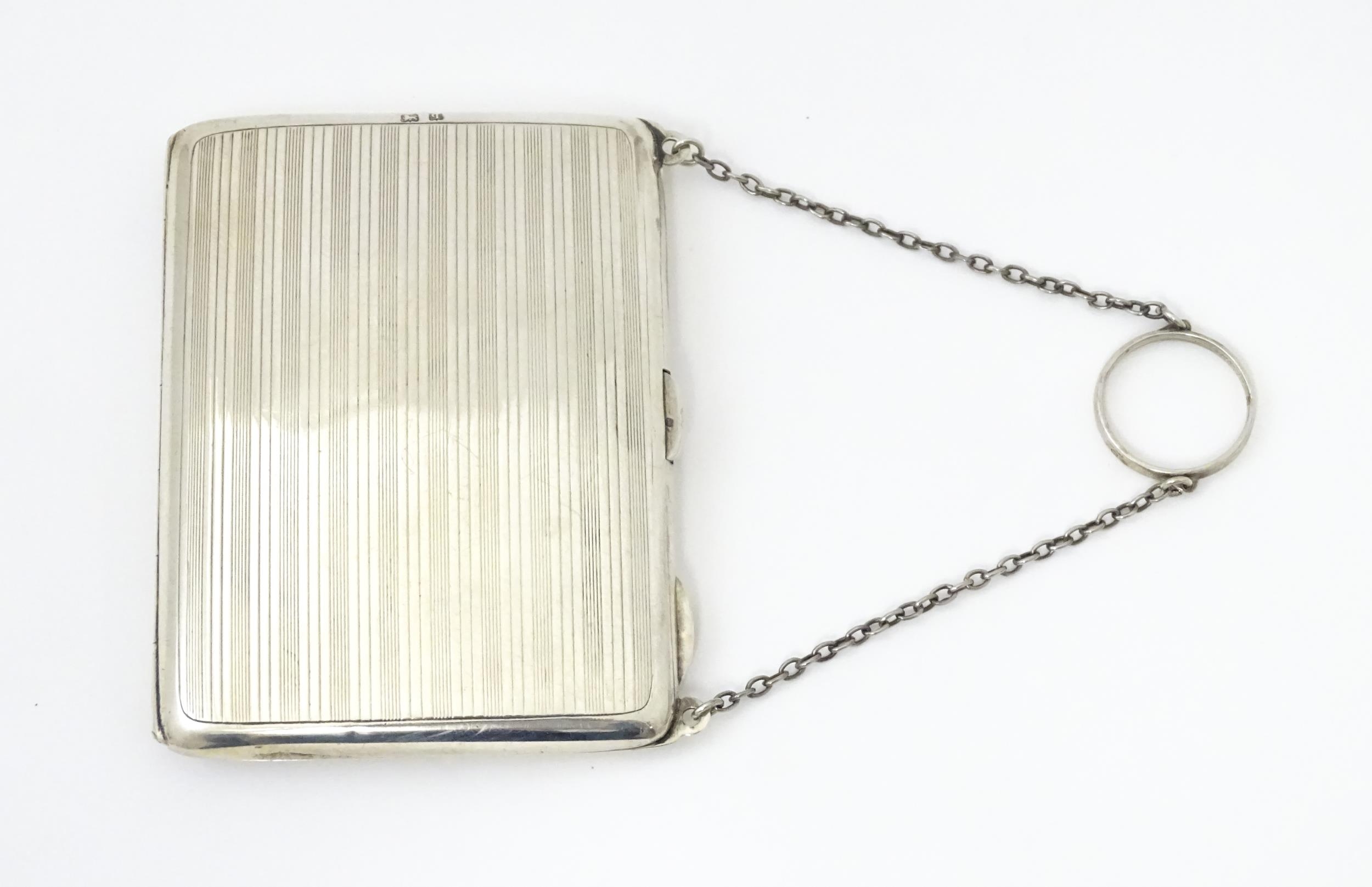 A silver purse / dance card case with leather lined interior. Hallmarked Birmingham, 1915 maker - Image 4 of 8