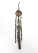 A white metal chatelaine the hanger front formed as an Un Duro (Girona) 1808 Spanish Fernando VII,