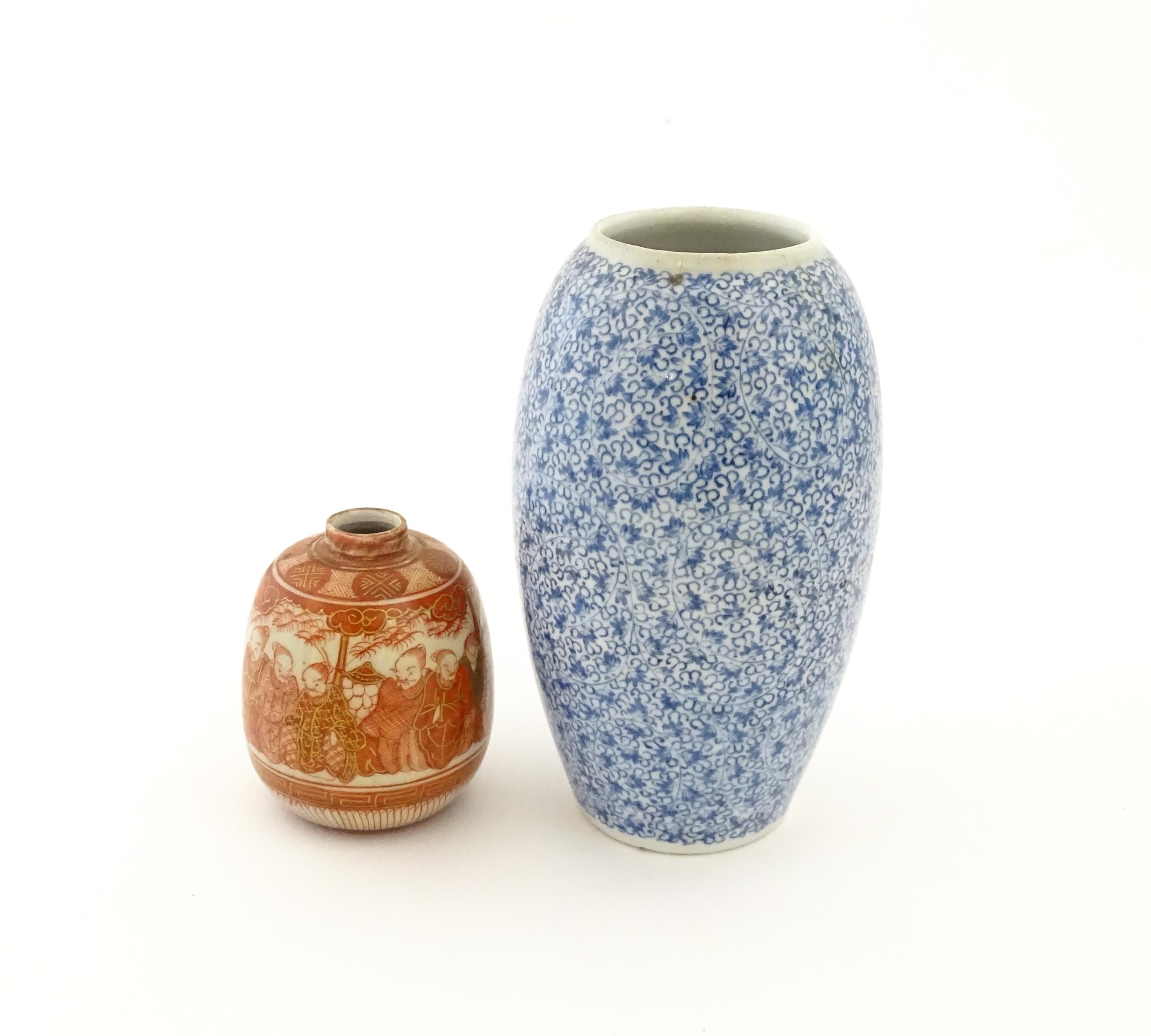 An Oriental blue and white vase of ovoid form decorated with scrolling foliage. Together with a - Image 5 of 8
