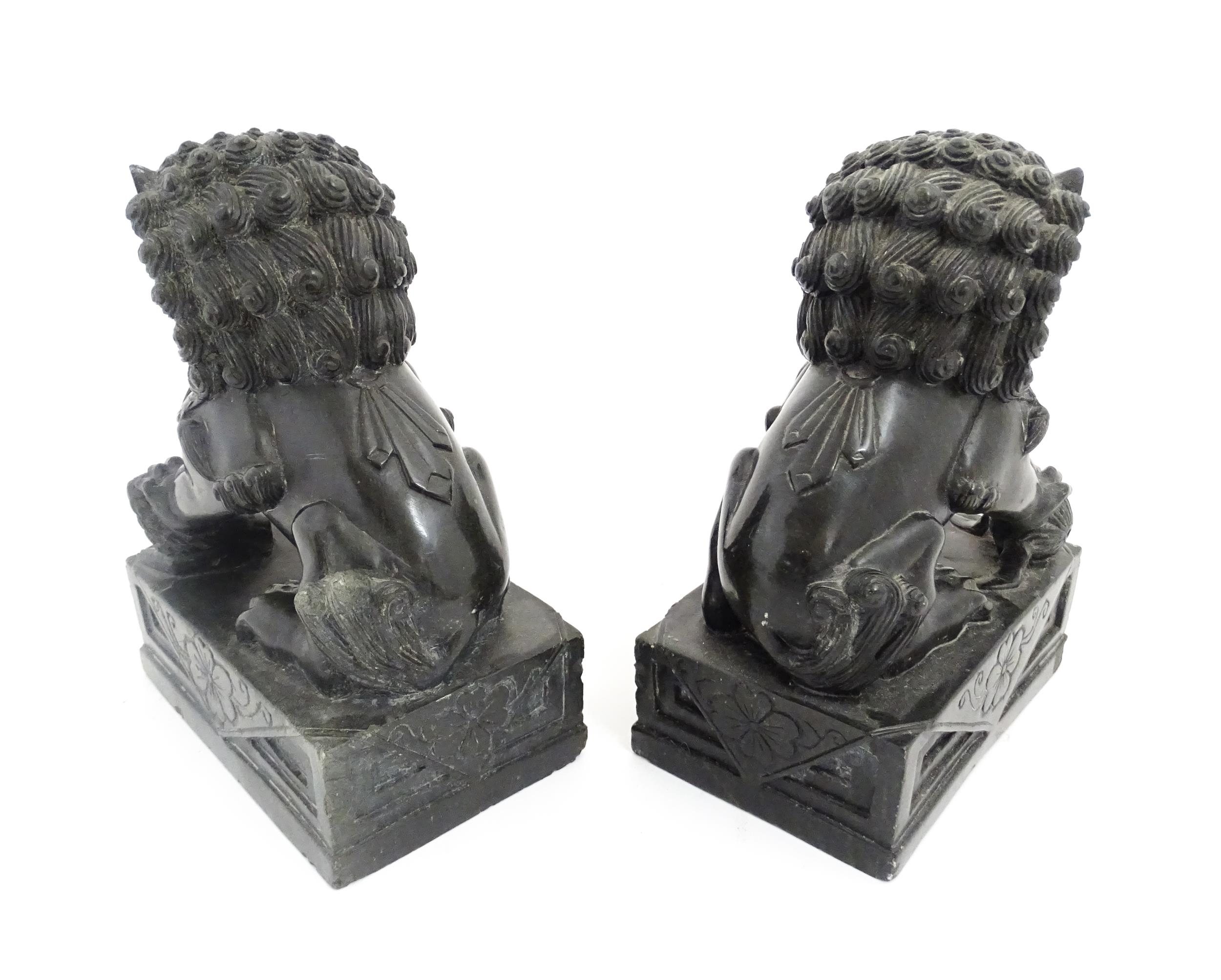 A pair of Chinese carved hardstone foo dogs / guardian lions with ball underfoot and loose ball - Image 4 of 6