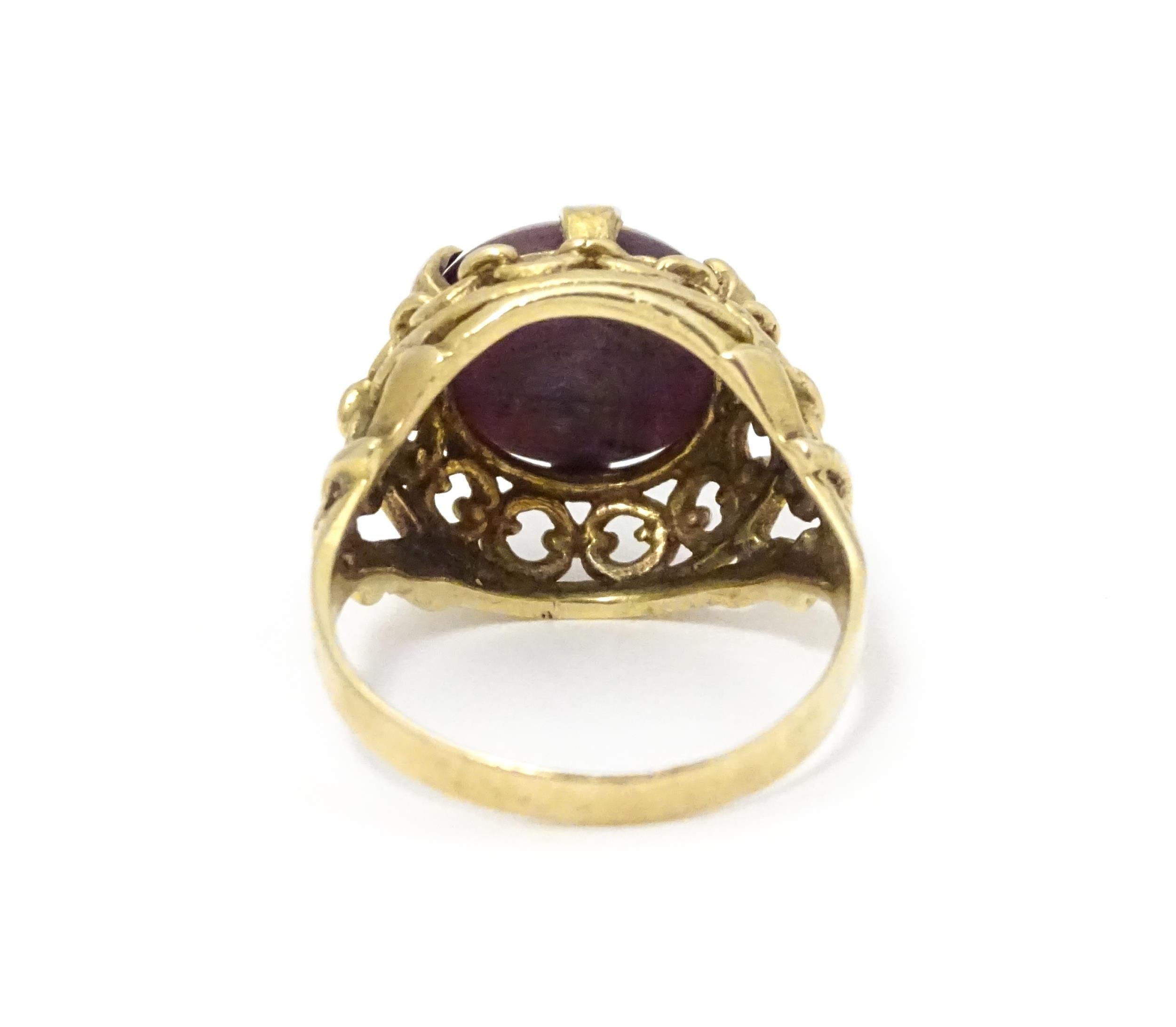 A 9ct gold ring set with ruby cabochon. Ring size approx. O Please Note - we do not make reference - Image 7 of 9