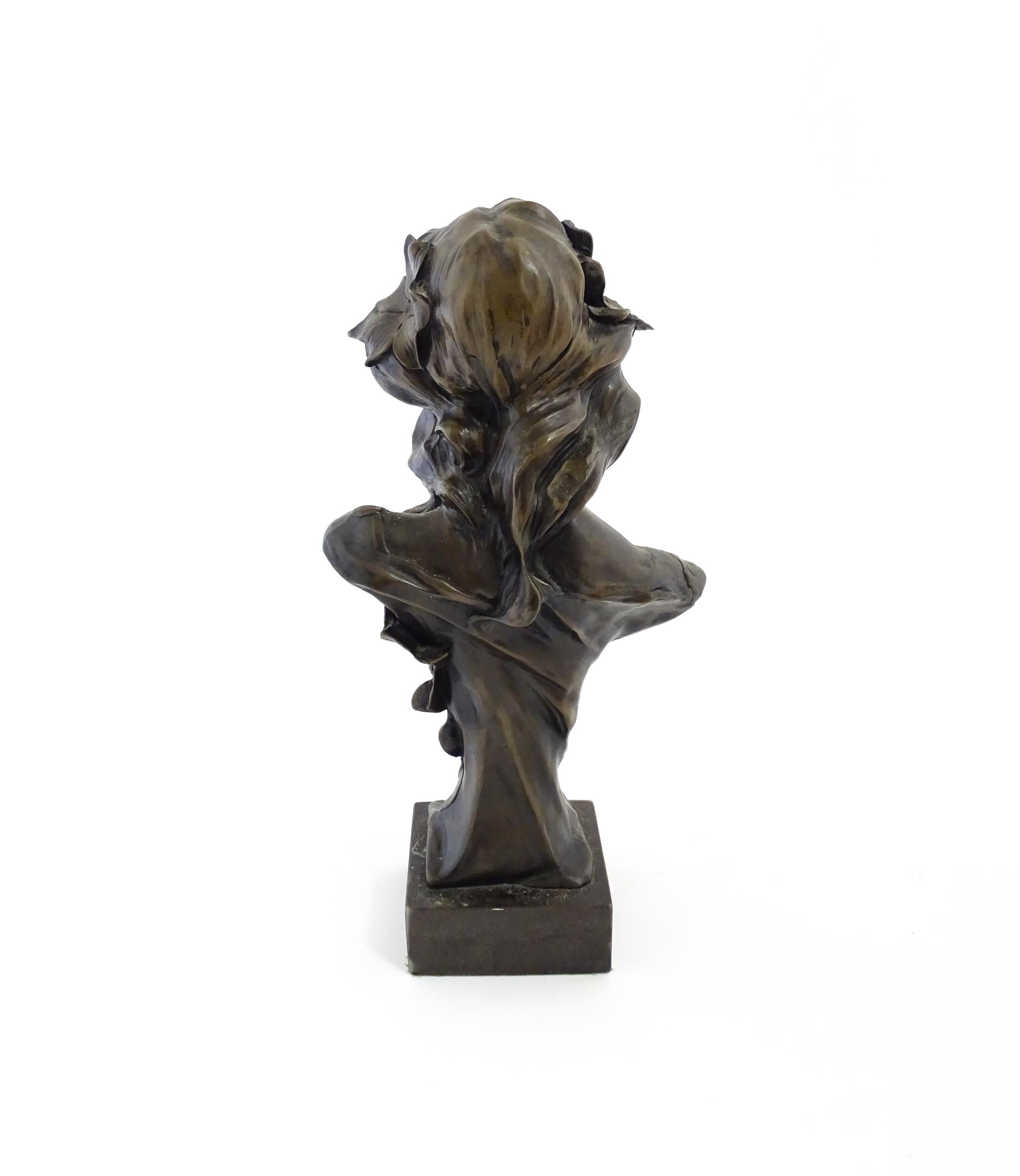 A 20thC cast bust depicting an young lady in the Art Nouveau style after Emmanuel Villanis. - Image 6 of 7