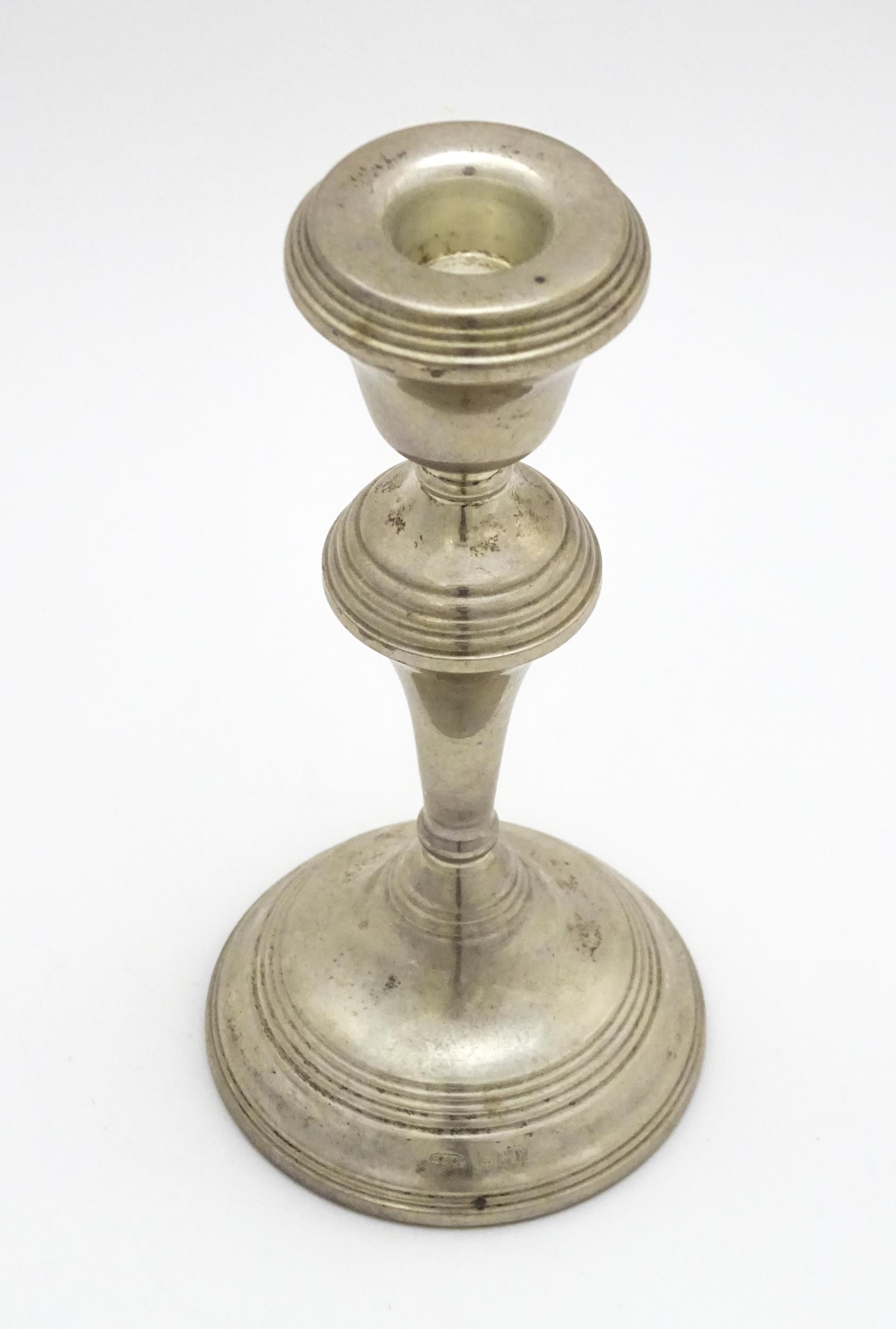 A silver candlestick hallmarked Birmingham 1973, maker W. I. Broadway. Approx. 7 1/4" high Please - Image 4 of 6