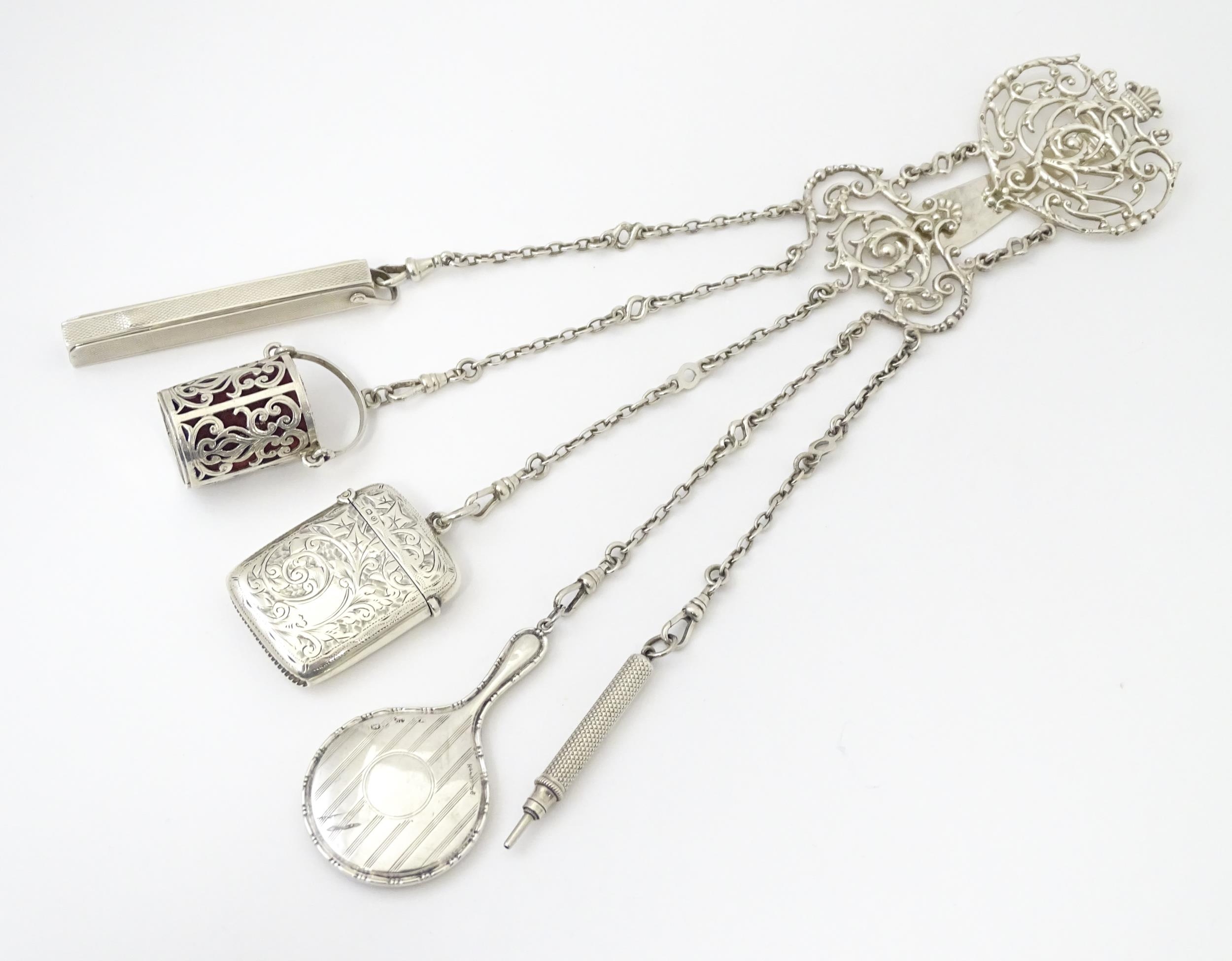 A silver chatelaine with openwork scrolling detail and having five chains, hallmarked Chester - Image 2 of 19