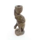 Ethnographic / Native / Tribal : An African carved soapstone candlestick formed as an elephant