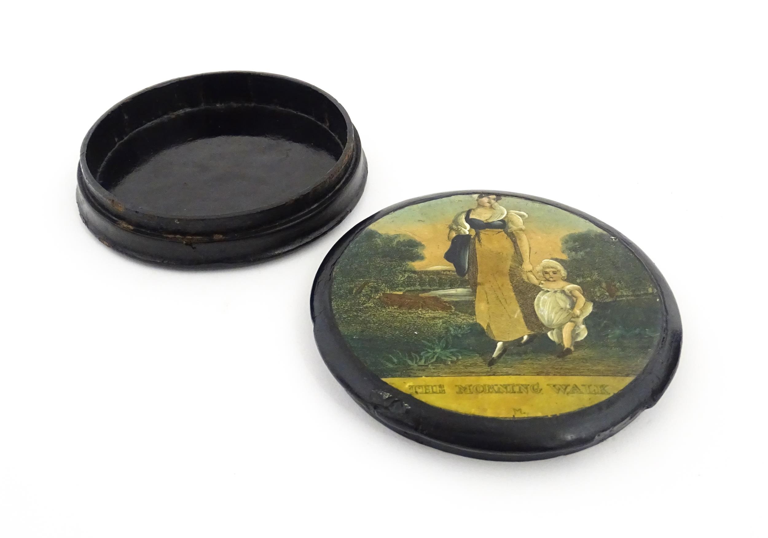 A 19thC papier mache lacquered snuff box of circular form, the lid with applied engraving titled The - Image 9 of 10