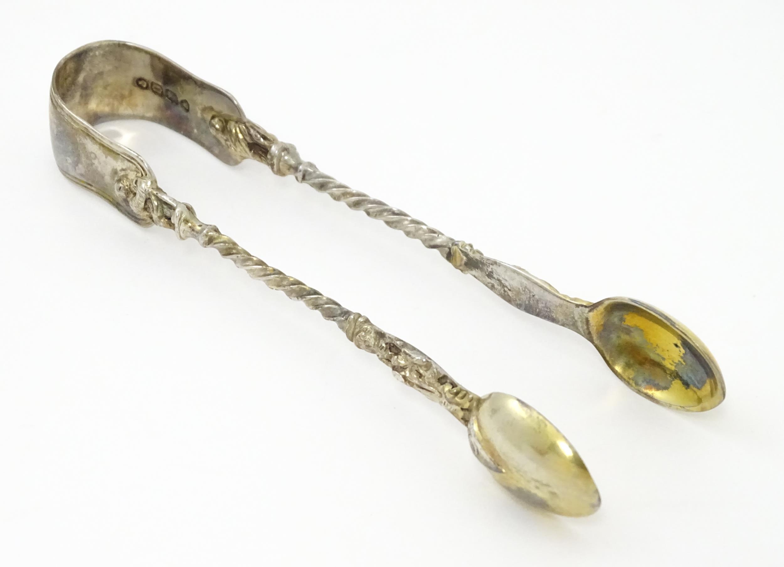 Victorian silver sugar tongs hallmarked London 1869, maker Henry Holland. Approx. 4 3/4" long Please - Image 2 of 7