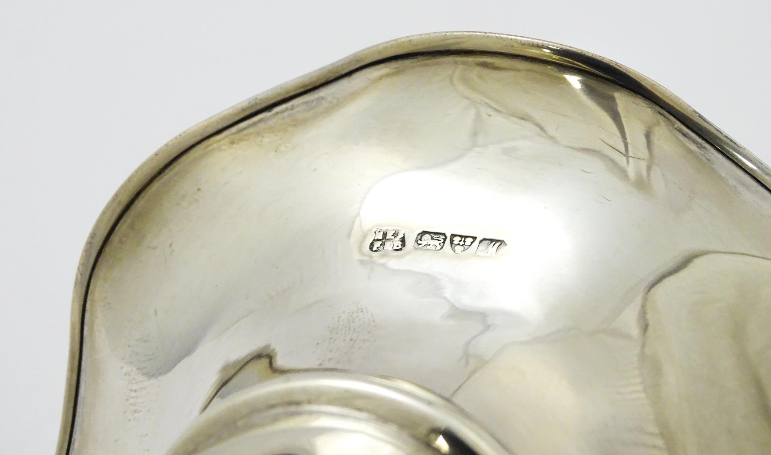 A silver vase hallmarked Chester 1912, maker Barker Brothers. Approx. 10" high Please Note - we do - Image 6 of 6