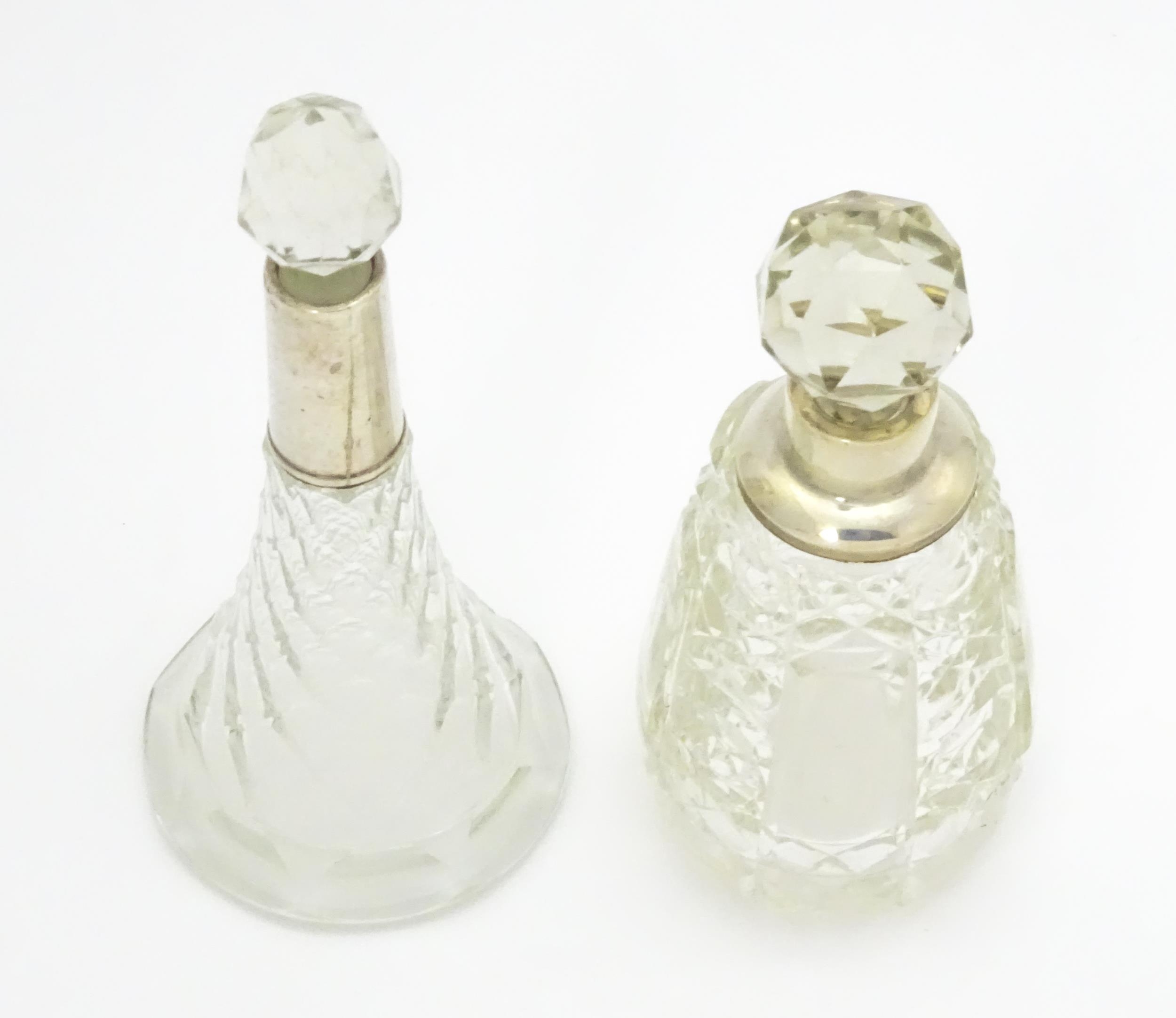 Two cut glass scent / perfume bottles with silver mounts, one hallmarked Birmingham 1921, maker A - Image 10 of 15
