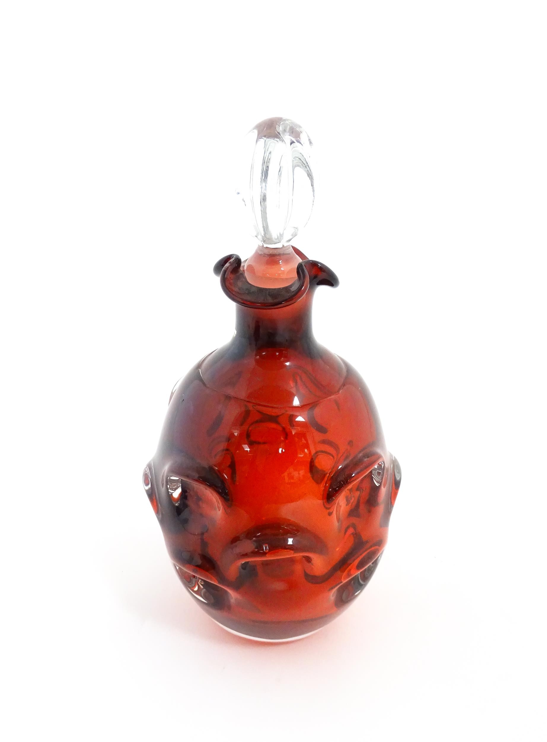 A Swedish studio glass decanter designed by Borne Augustsson for Aseda Glasbruk. Approx. 11" high