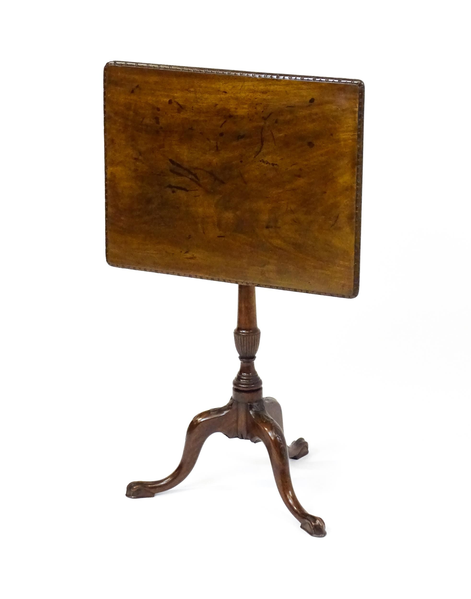 A late 18thC / early 19thC mahogany occasional table with a rectangular top and carved edge above - Image 2 of 12