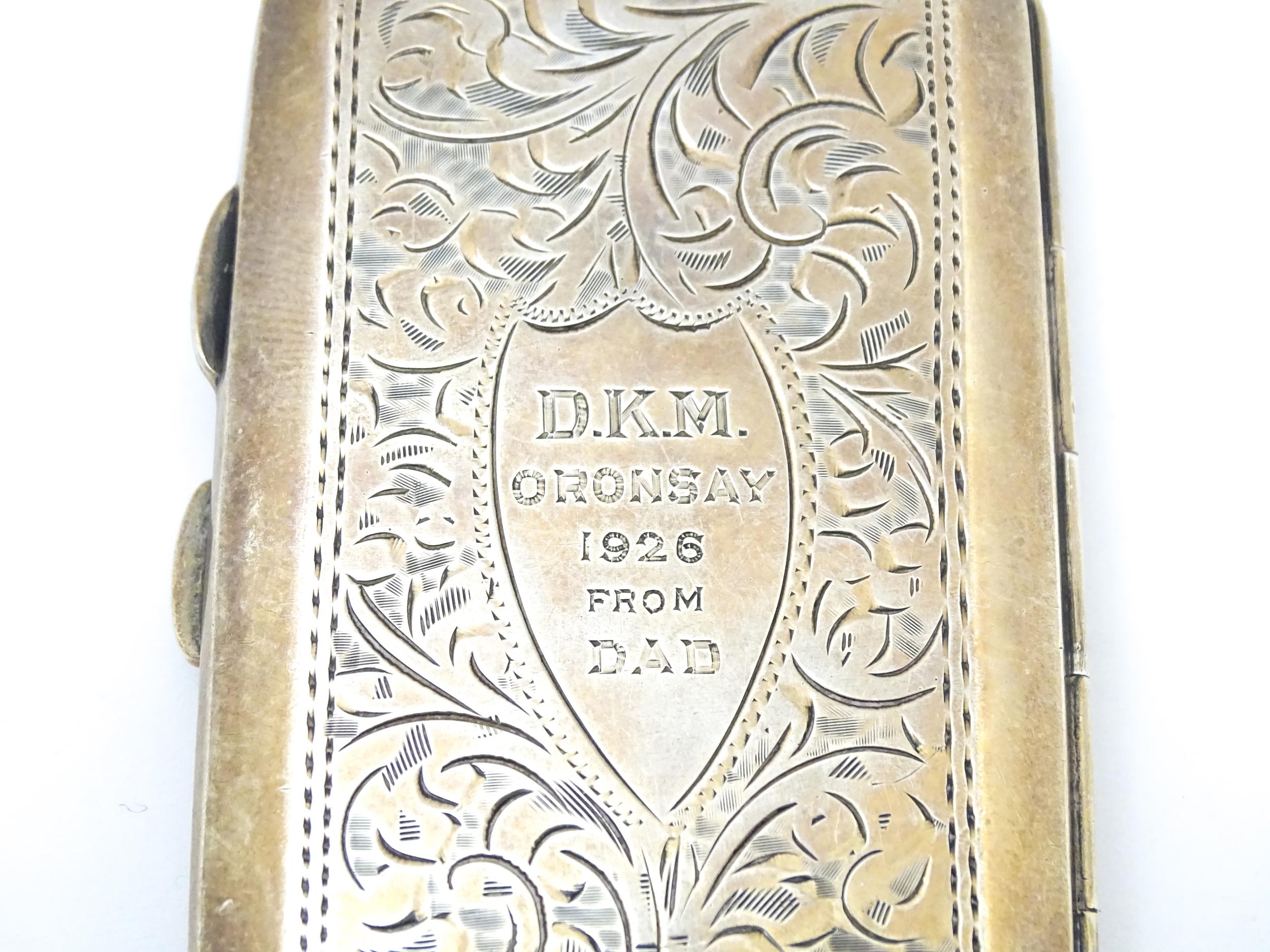 A silver cigarette case with acanthus decoration and engraved 'D. K. M. Oronsay ...', opening to - Image 6 of 7