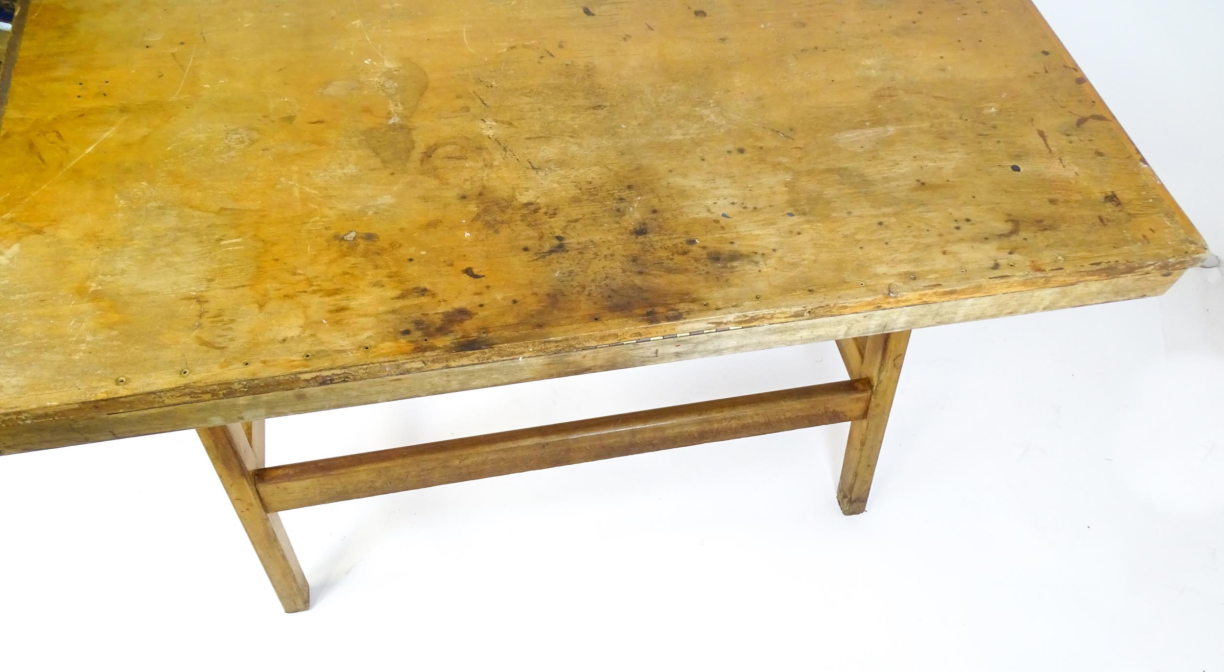 A mid / late 20thC artists desk with a hinged, adjustable top raised on tapering legs united by a - Image 6 of 11