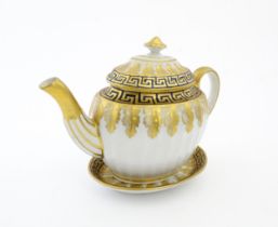 A Coalport John Rose teapot and stand with Greek Key detail. Teapot approx. 9 1/2" long Please