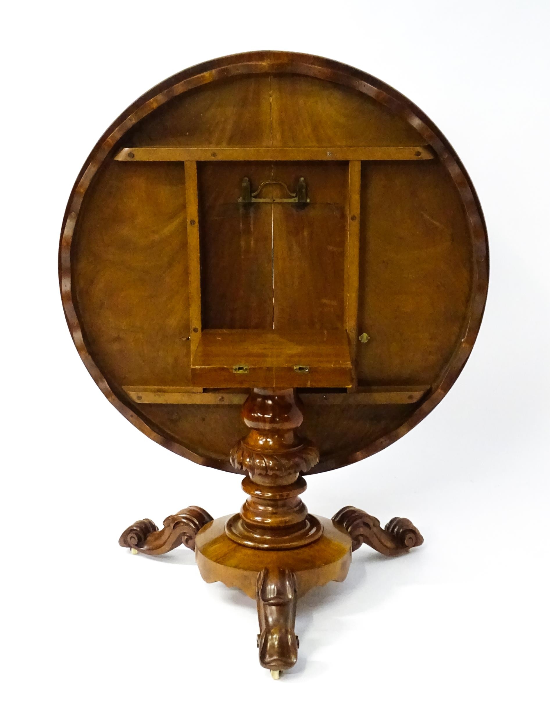 A 19thC mahogany tilt top breakfast table with a carved frieze above a turned and carved pedestal - Image 4 of 11