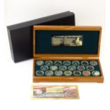 Coins: A cased collection of coins titled The Twenty Centuries AD - Coin Collection, produced by the