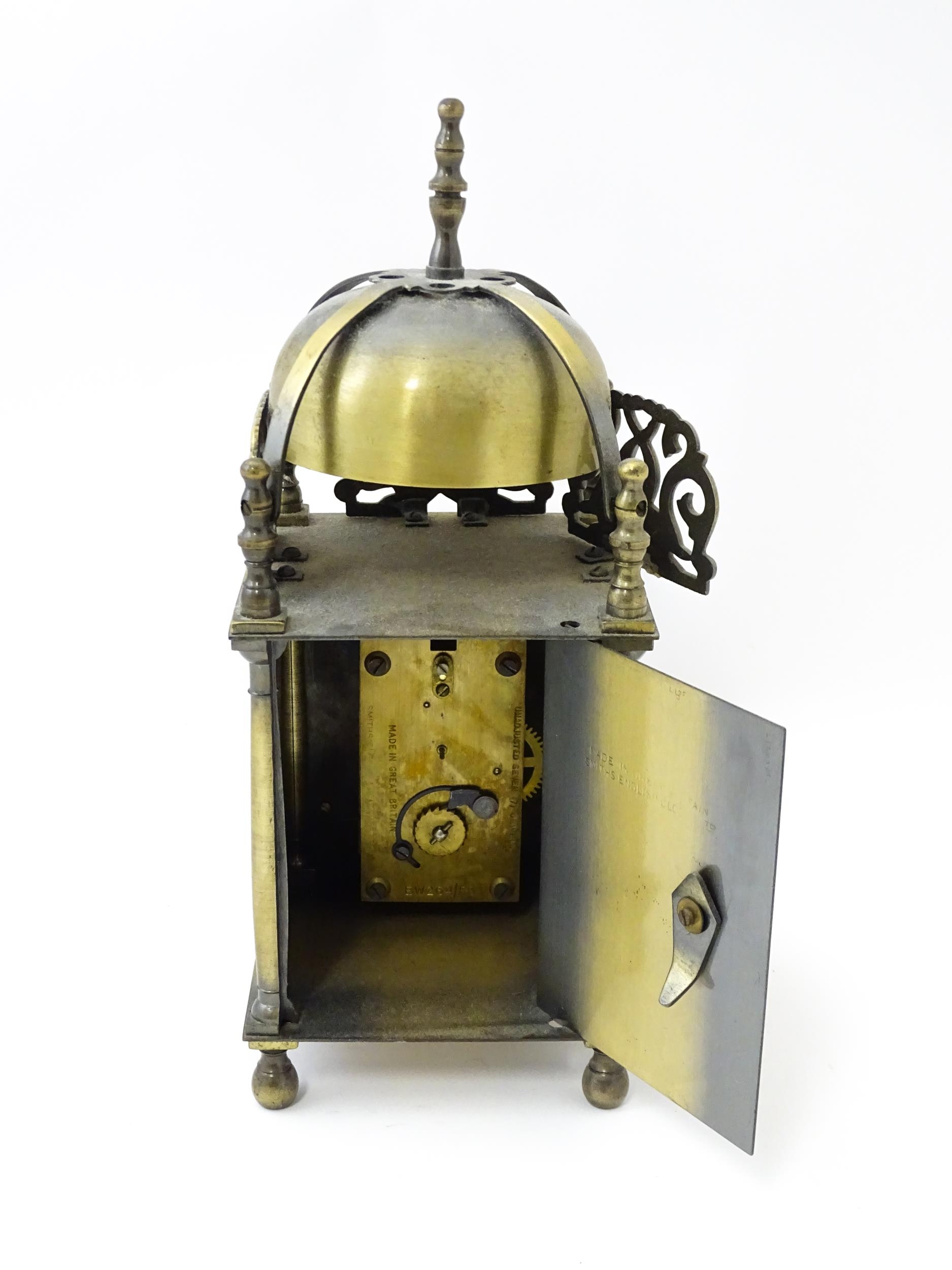 Smiths - Great Britain : A 20thC brass lantern clock by Smiths with engraved dial and Roman - Image 2 of 11