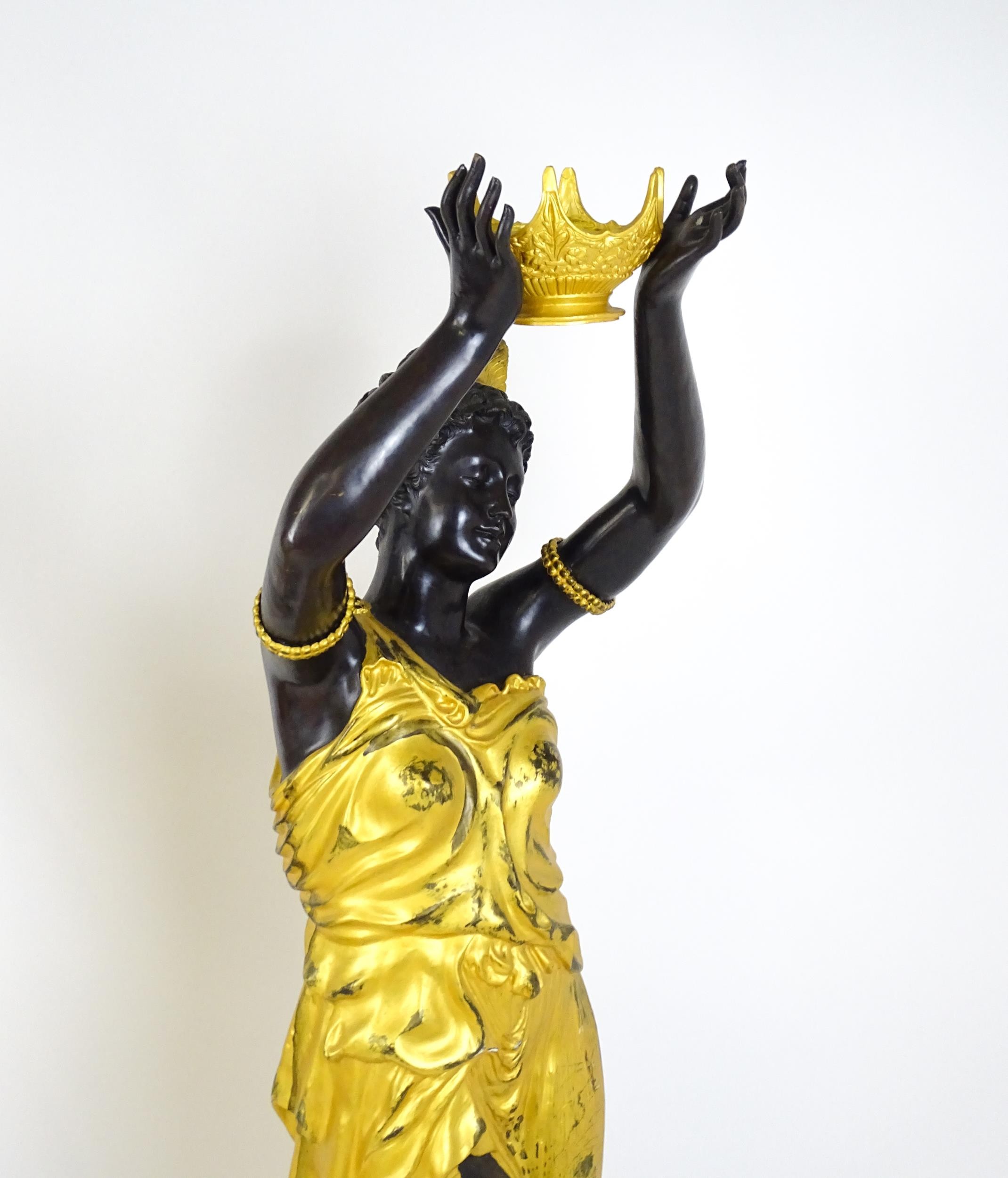 A pair of large cast bronze female blackamoor torcheres with gilt detail, raised on marble - Image 12 of 15