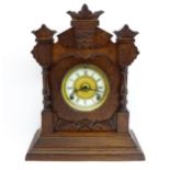 A Late 19thC / Early 20thC American oak cased mantle clock by the Ansonia Clock Company - New