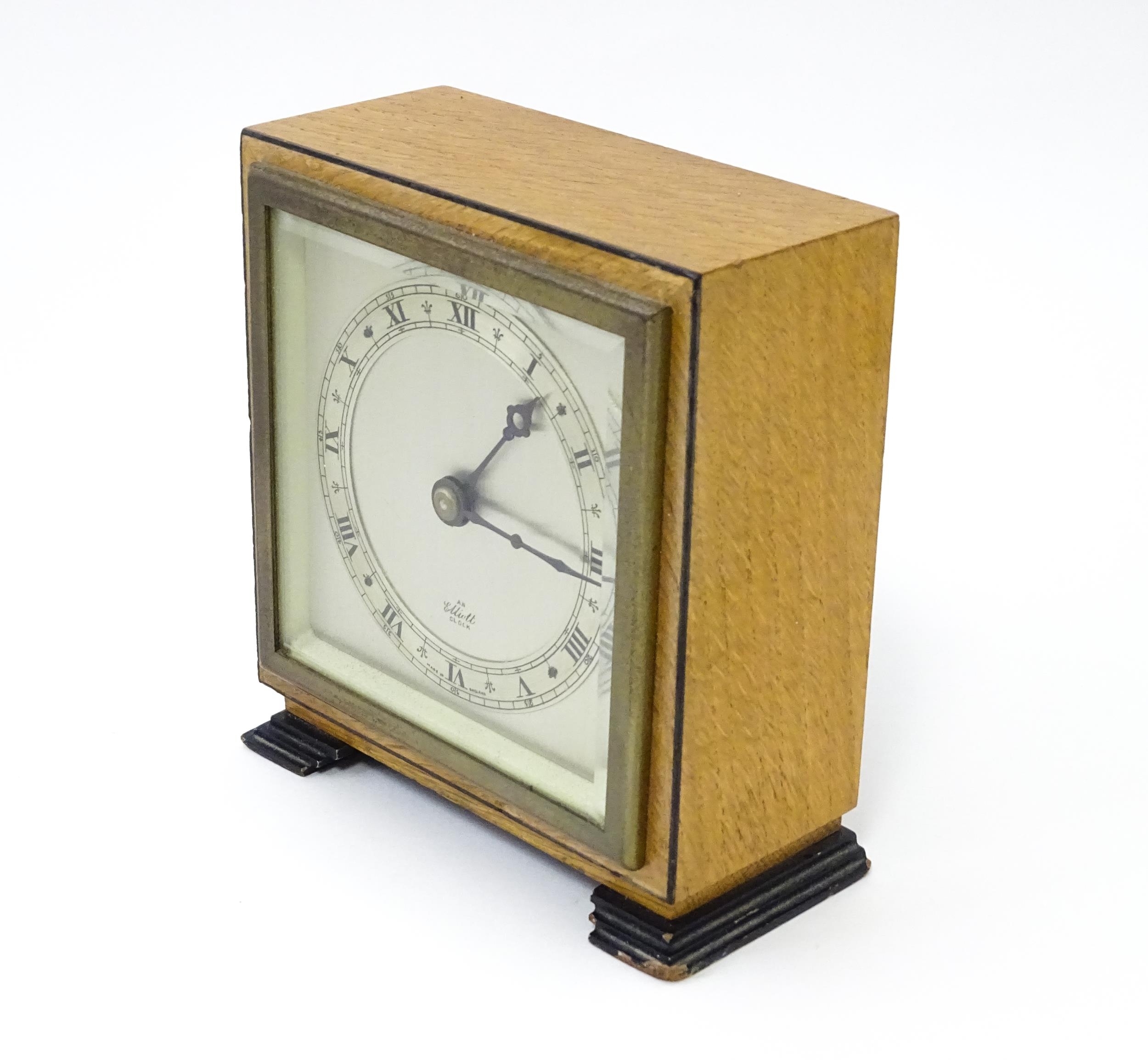 A 20thC mantle clock by Elliott. the dial with Roman numeral chapter ring and signed ' An Elliott - Image 7 of 8