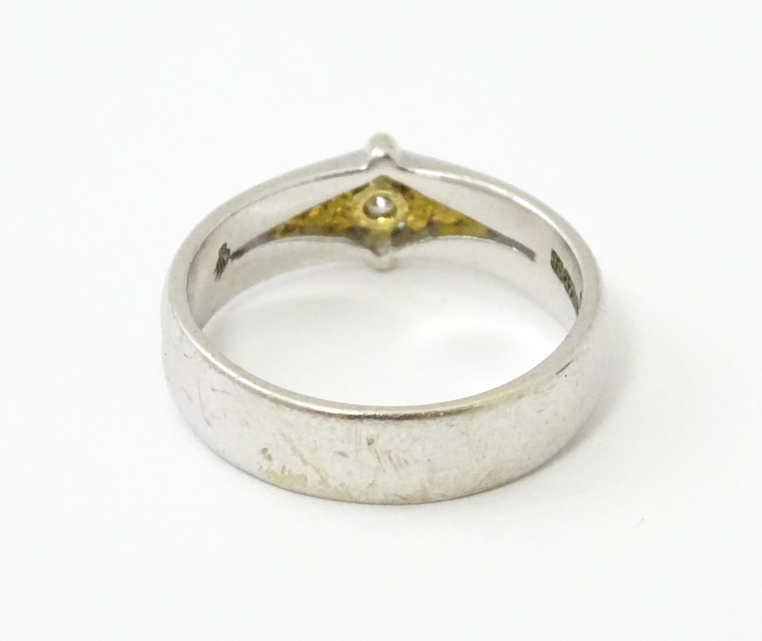 A 9ct white gold ring set with central diamond and gilt detail. Ring size approx. N Please Note - we - Image 6 of 6