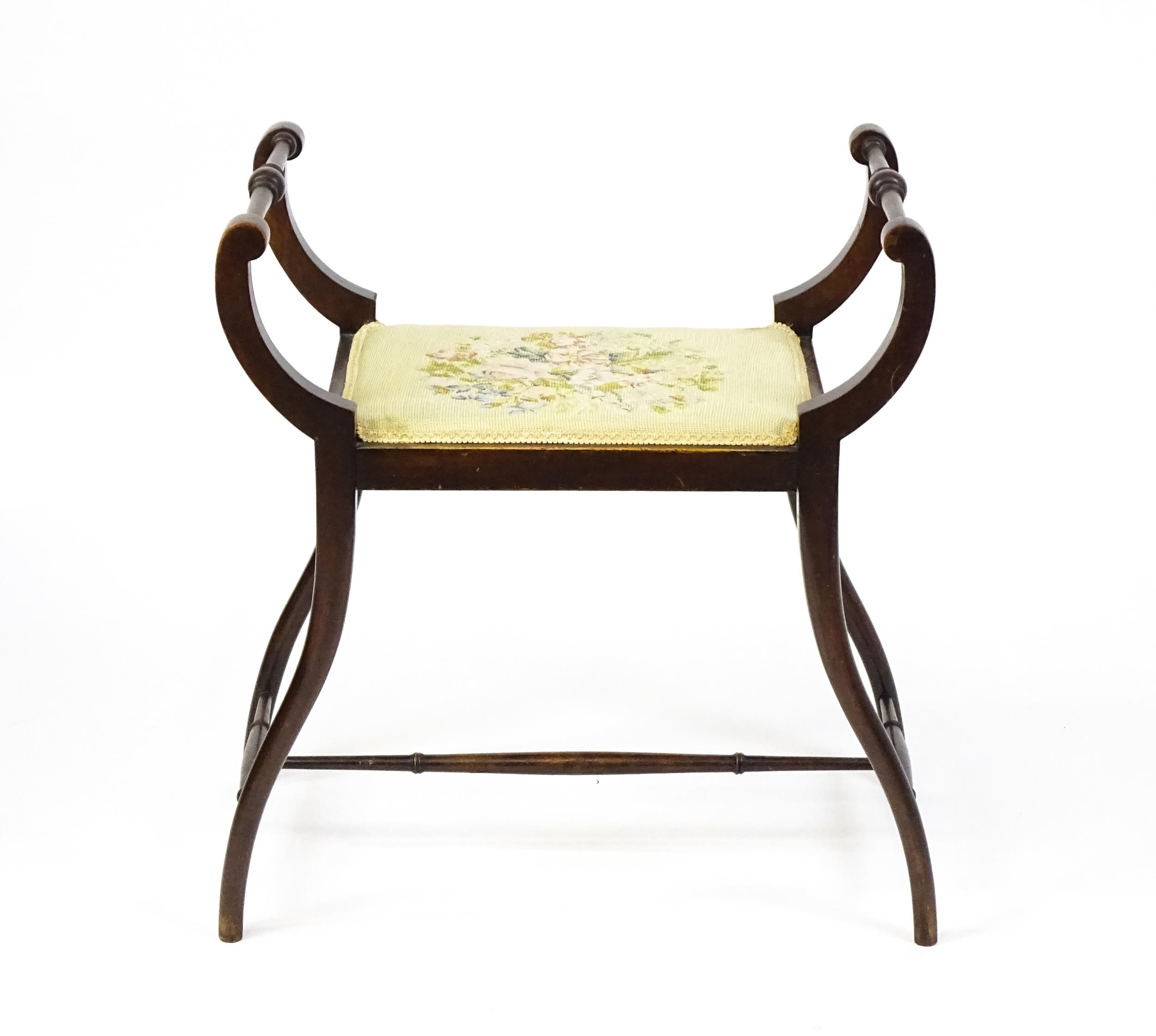 An early 20thC piano stool / window seat with two turned handles above a needlework seat and - Image 5 of 5