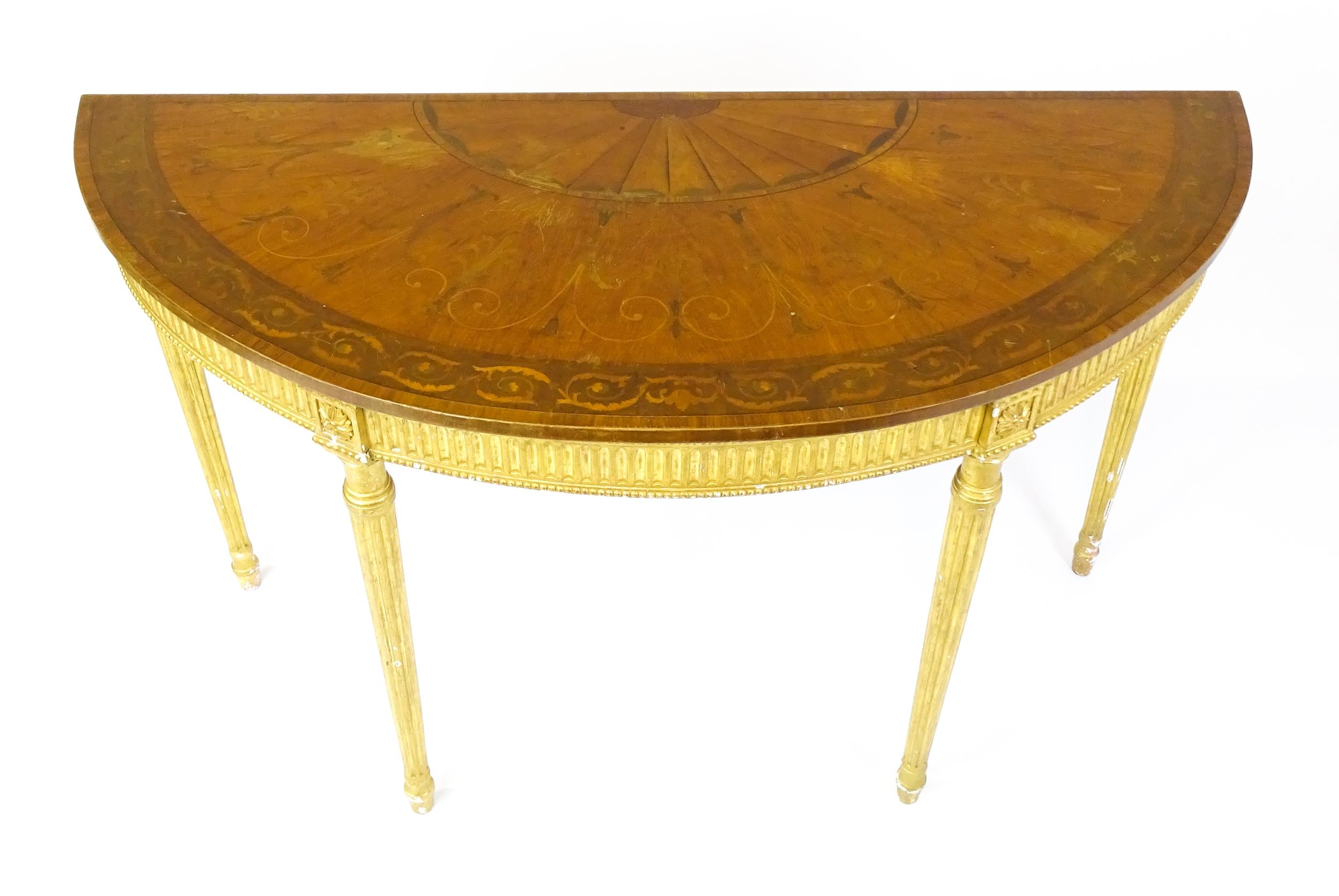 A demi lune console table with a marquetry inlaid top above a fluted frieze and moulded floral - Image 4 of 11