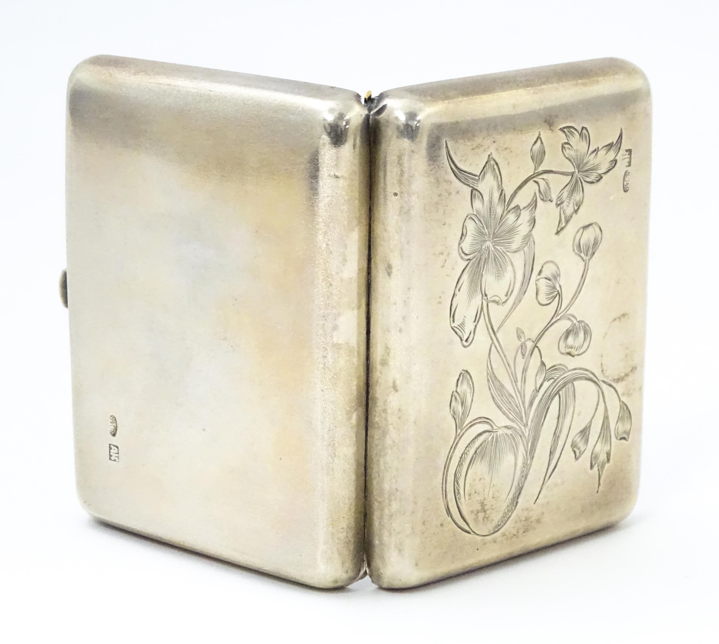 A late 19th / early 20thC Russian silver cigarette / snuff box with engraved floral decoration. - Image 4 of 7