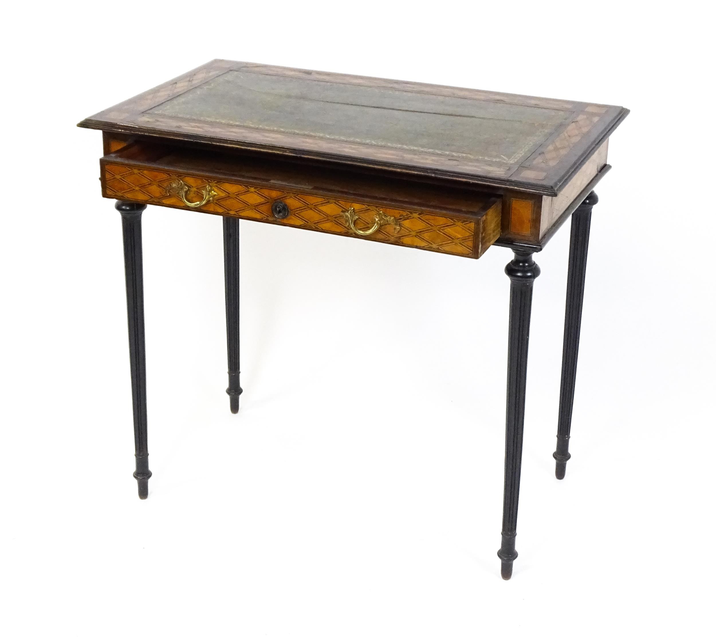 A 19thC side table with a satinwood inlaid top enclosing a gold tooled green leather top above a - Image 9 of 10