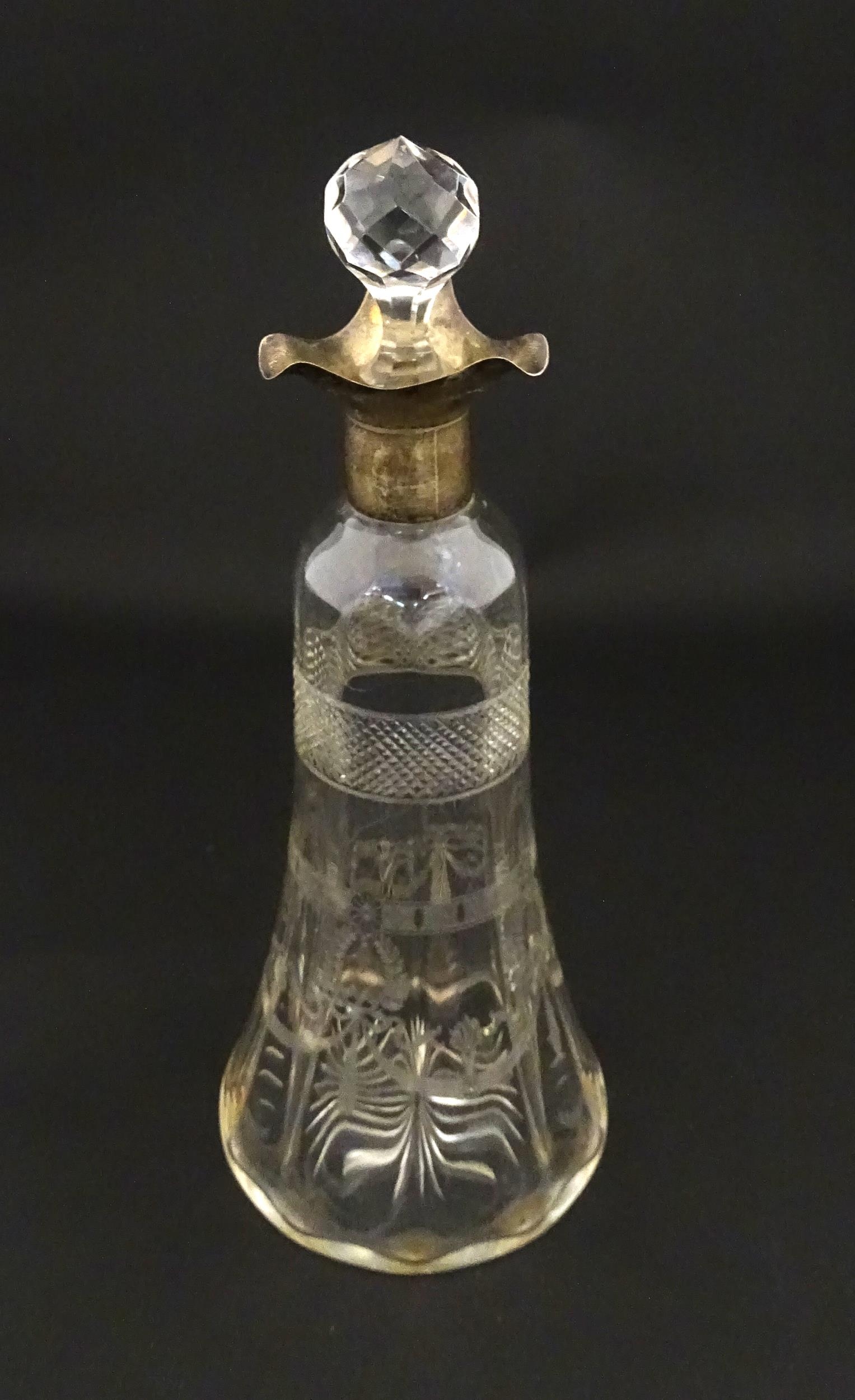 A cut glass decanter with silver mounts hallmarked Birmingham 1911. Approx. 9 1/4" high Please - Image 6 of 9