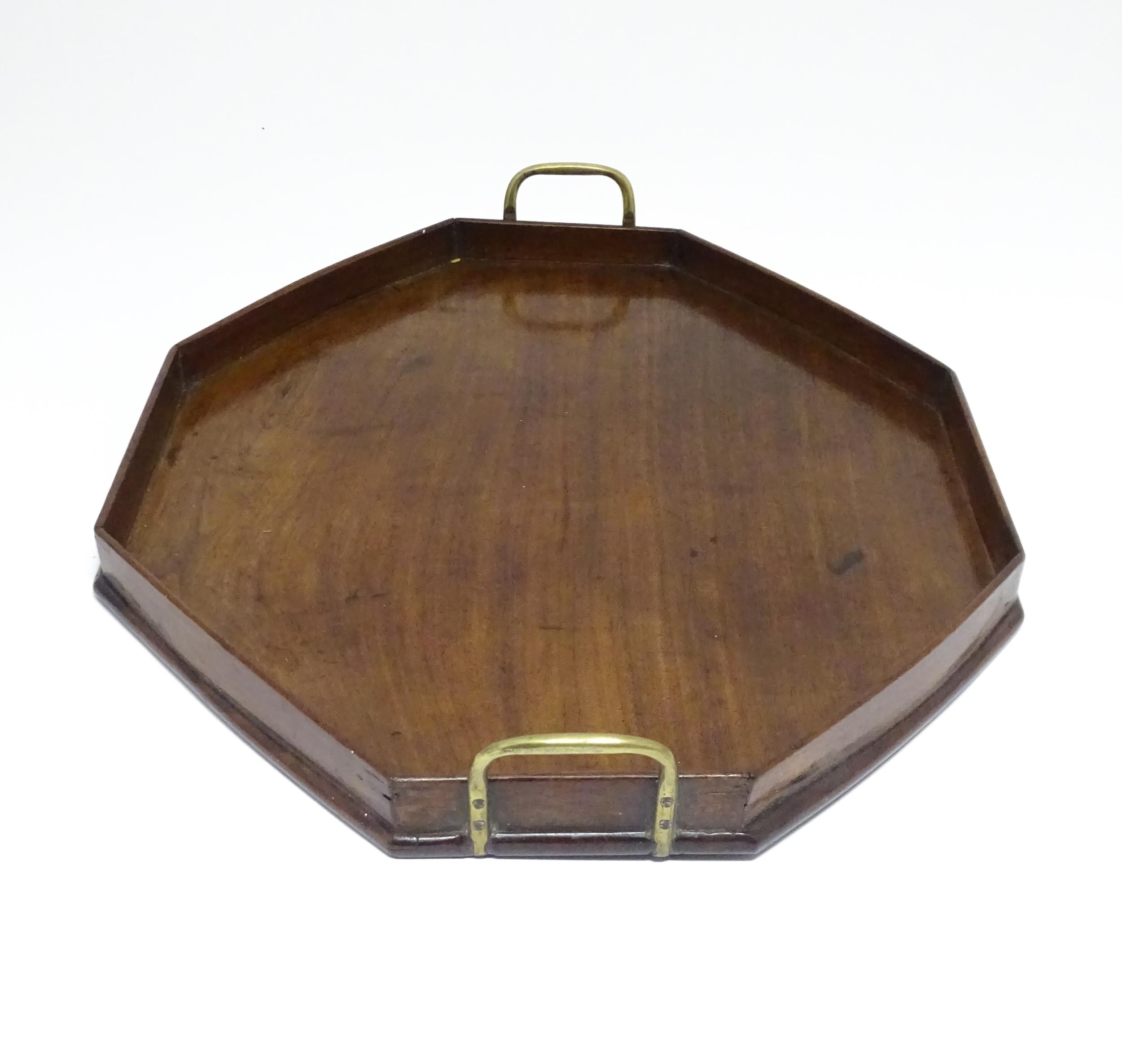 A late 19th / early 20thC mahogany tray of octagonal form with twin handles. Approx. 21 1/4" x 16 - Image 4 of 7