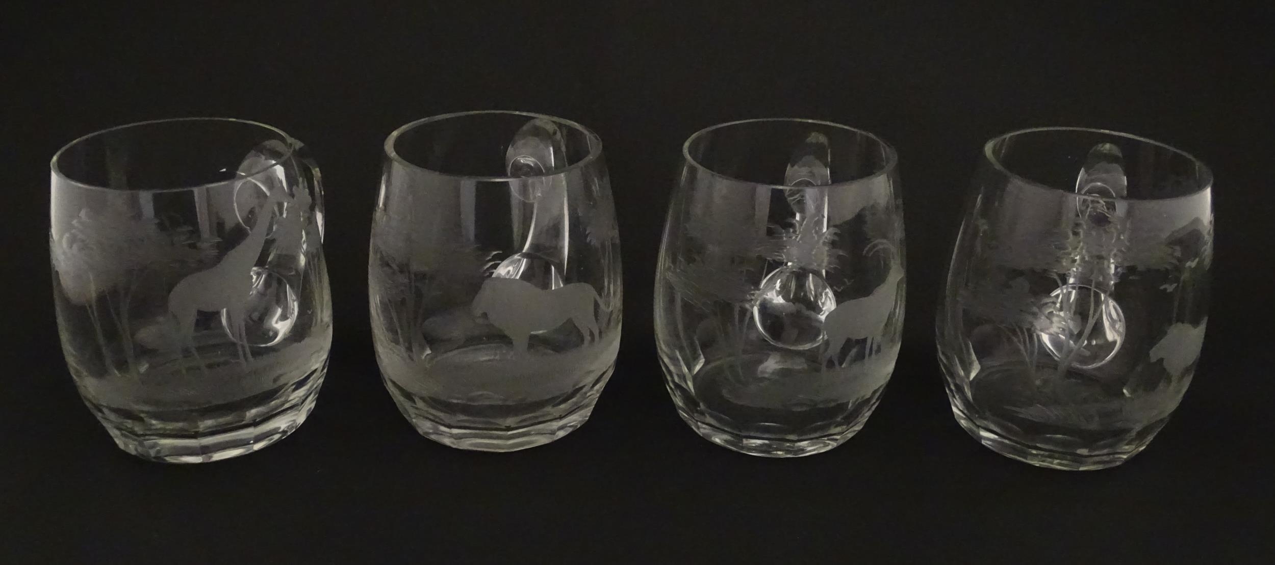 Seven Rowland Ward pint mugs / glasses with engraved Safari animal detail. Unsigned. Approx. 4 1/ - Image 11 of 26