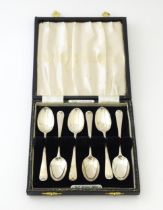 A set of six Victorian silver fancy back teaspoons with flowering urn detail, hallmarked London