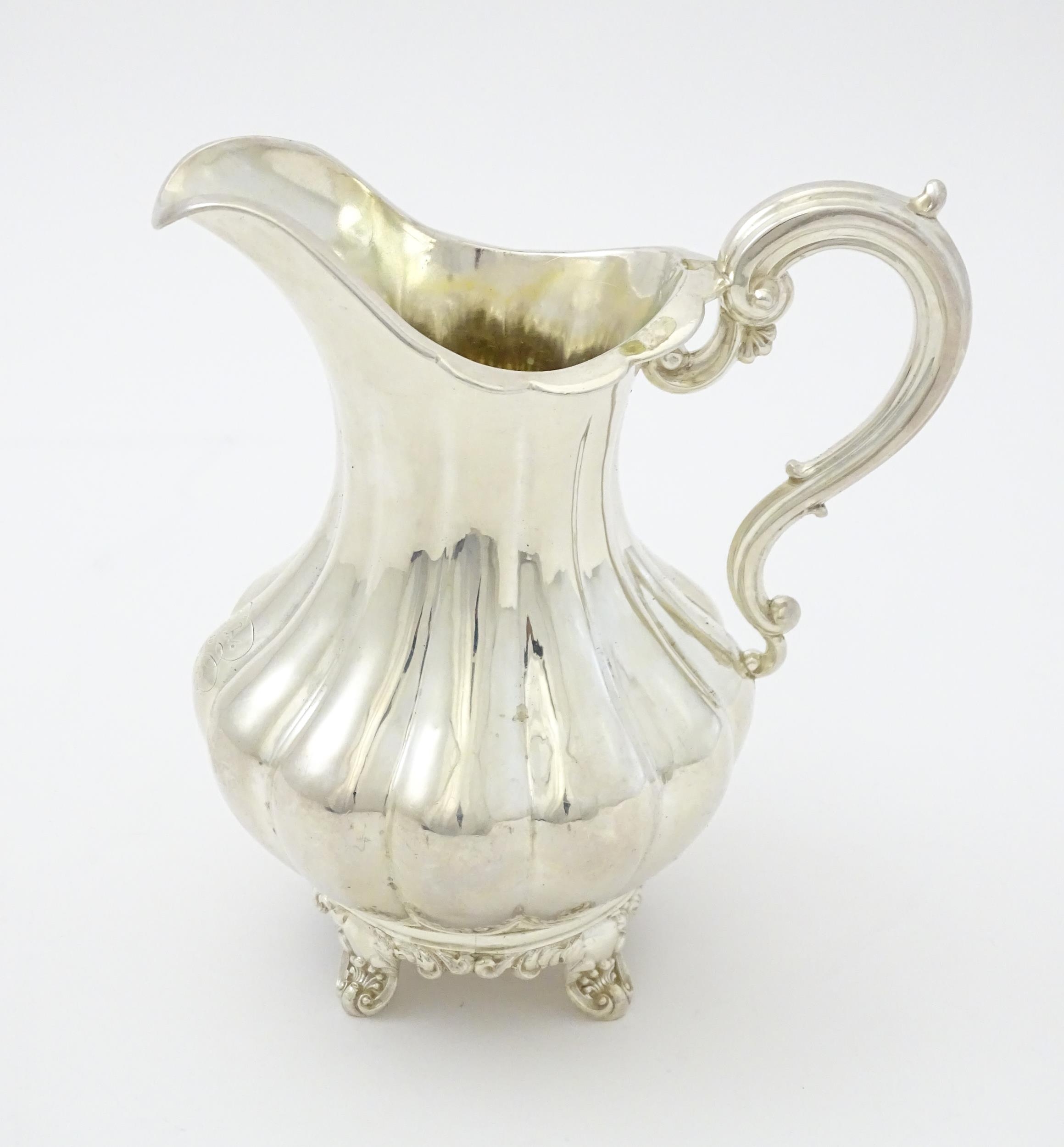 A Victorian silver jug hallmarked London 1851, maker Samuel Hayne & Dudley Cater. Approx. 6 1/4"
