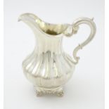 A Victorian silver jug hallmarked London 1851, maker Samuel Hayne & Dudley Cater. Approx. 6 1/4"