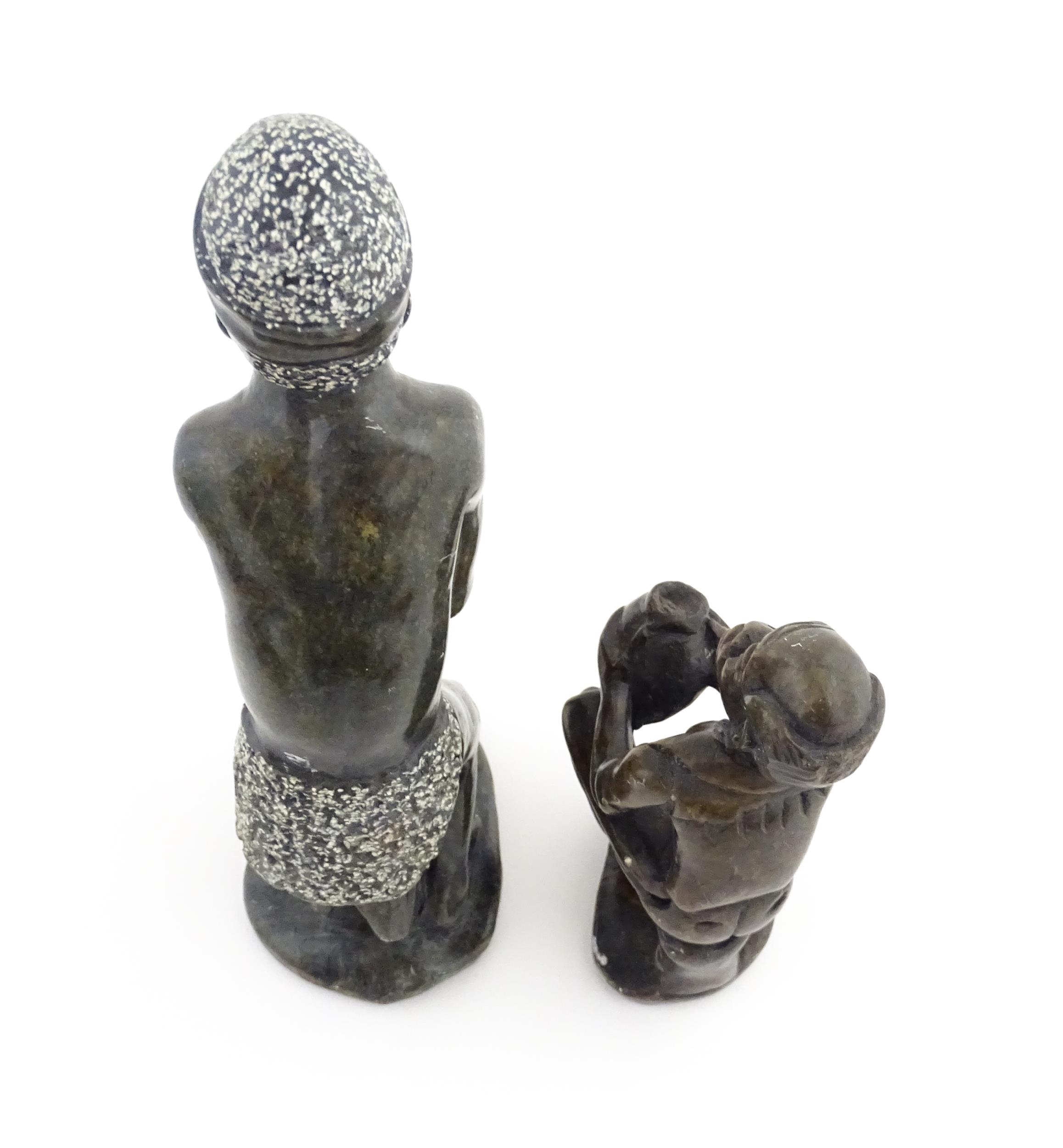 Ethnographic / Native / Tribal : An African soapstone carving modelled as a tribesman playing a - Image 5 of 6