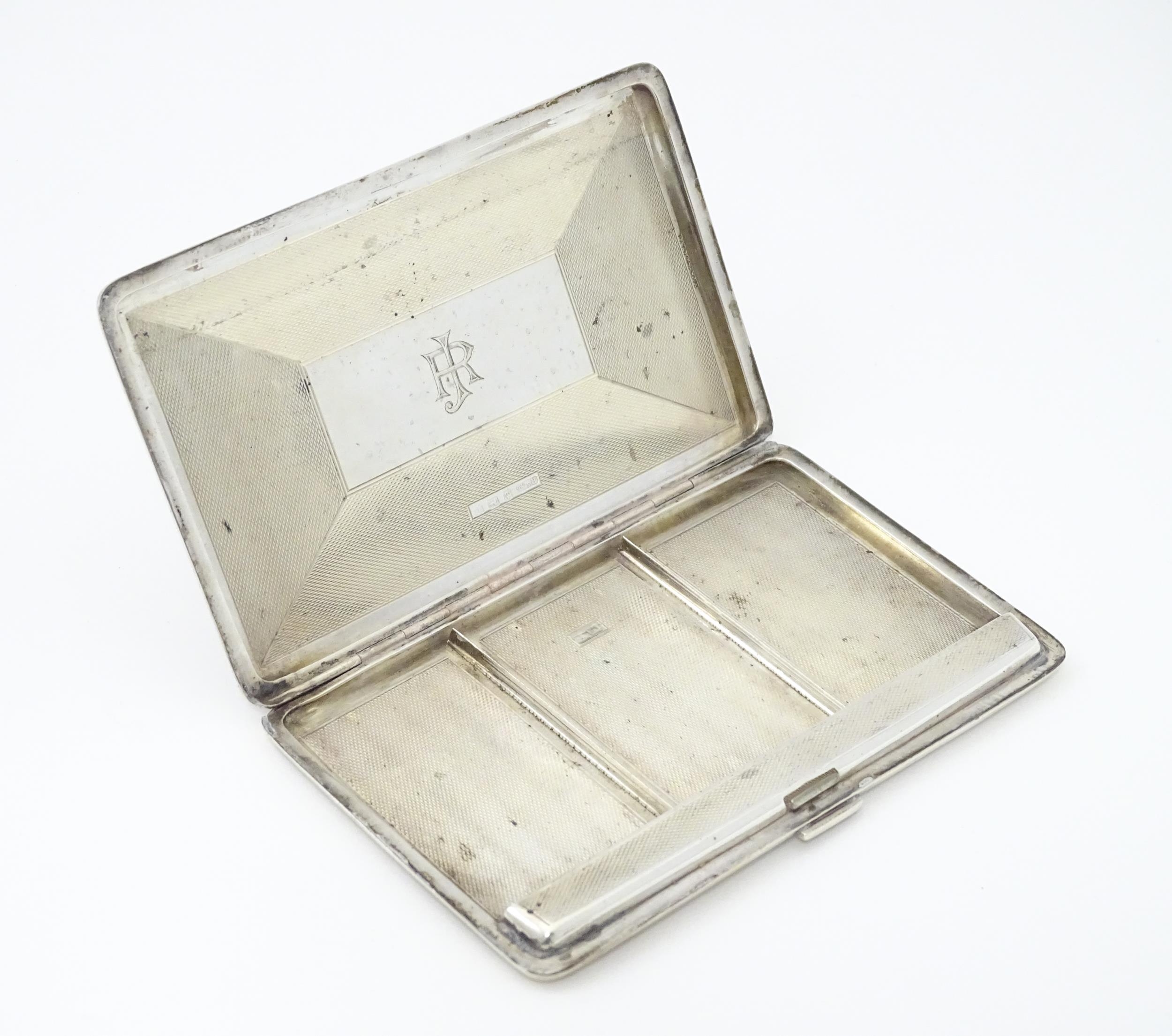 An Art Deco silver cigarette case with three sectional interior hallmarked Birmingham 1933, maker - Image 6 of 11