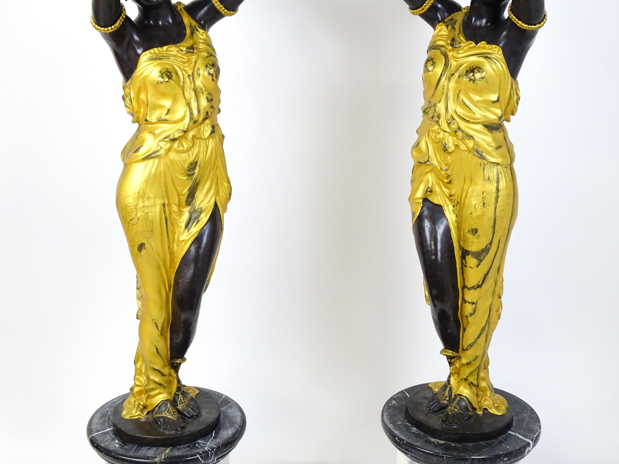 A pair of large cast bronze female blackamoor torcheres with gilt detail, raised on marble - Image 4 of 15