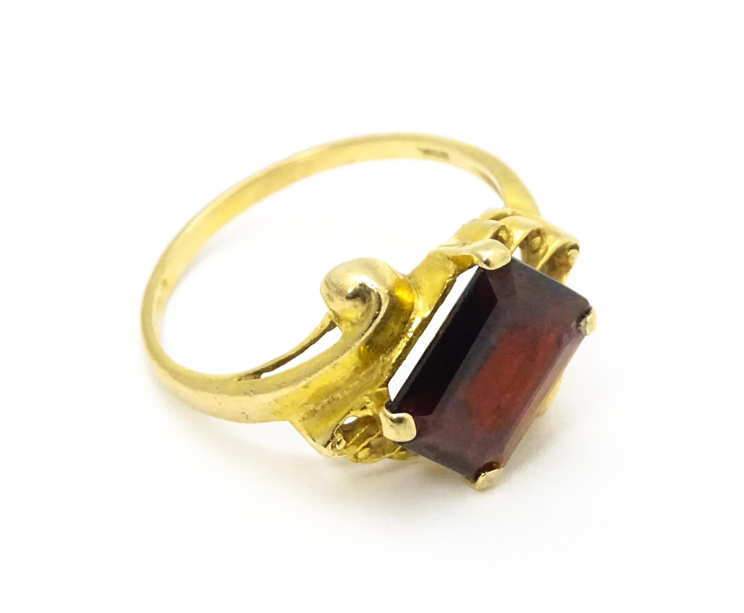 A 9ct gold ring set with central garnet. Ring size approx. O 1/2 Please Note - we do not make - Image 4 of 7