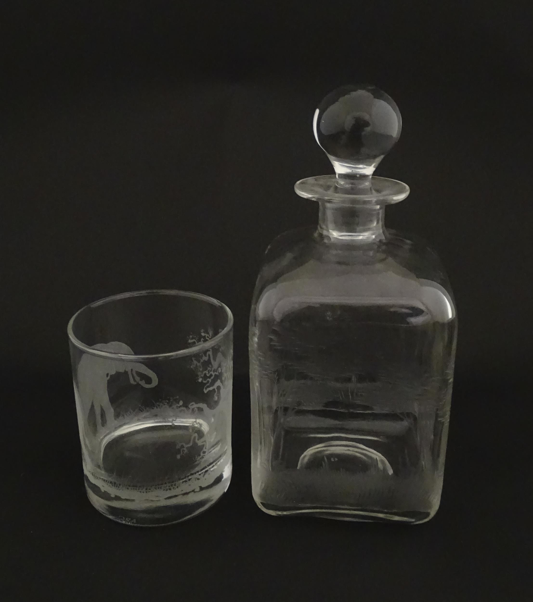 A Rowland Ward decanter glass with engraved Safari animal detail. Unsigned. Together with a similar - Image 6 of 11