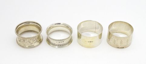 Four assorted silver napkin rings hallmarks to include Birmingham 1898, maker Joseph Gloster,